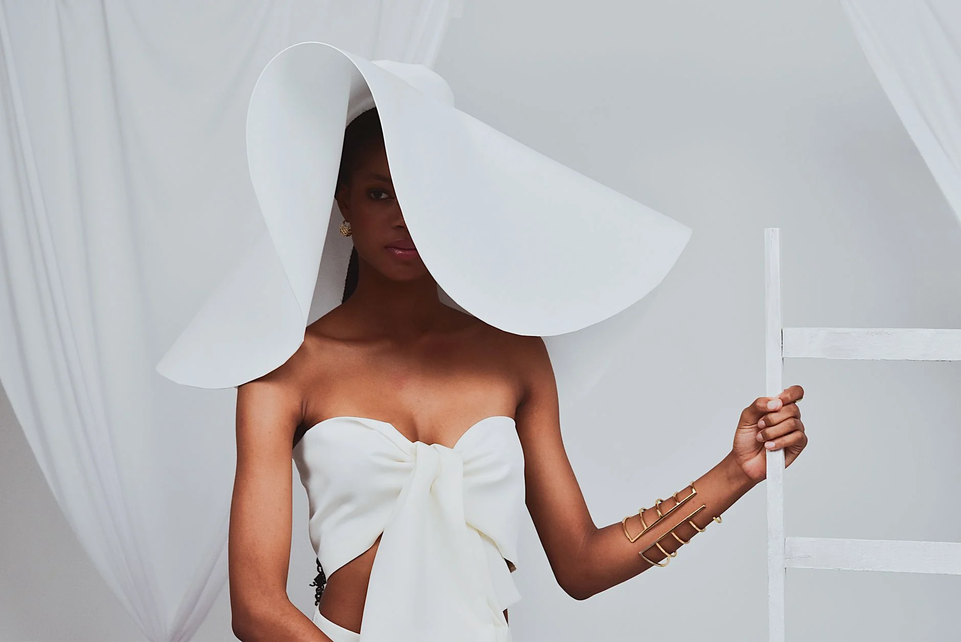 Sculptural white fashion editorial look 5
